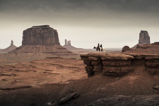 The classic vista of the western film. Tonto and The Lone Ranger take in the view. Courtesy Walt Disney Pictures