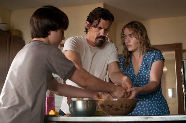 (Left to right) Gattlin Griffith is Henry, Josh Brolin is Frank and Kate Winslet is Adele in LABOR DAY Written for the Screen and Directed by Jason Reitman to be released by Paramount Pictures and Indian Paintbrush. LD-03422