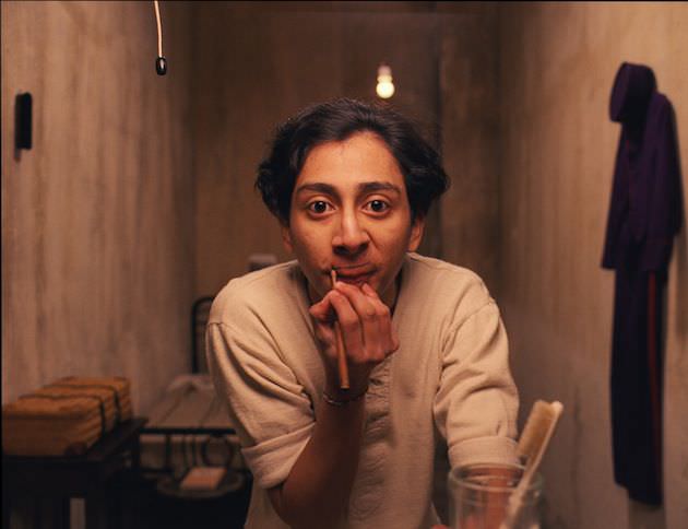 Tony Revolori as Zero in the servants quarters. Courtesy Fox Searchlight Pictures.