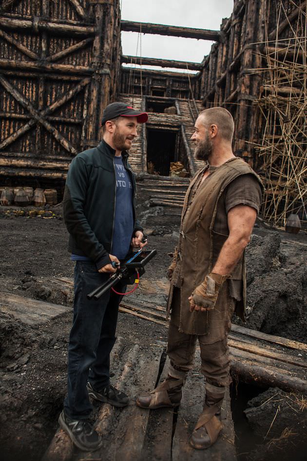 Darren Aronofsky and Russell Crowe on the set at Planting Fields Arborteum State Historic Park in Oyster Bay, New York. Courtesy Paramount Pictures.