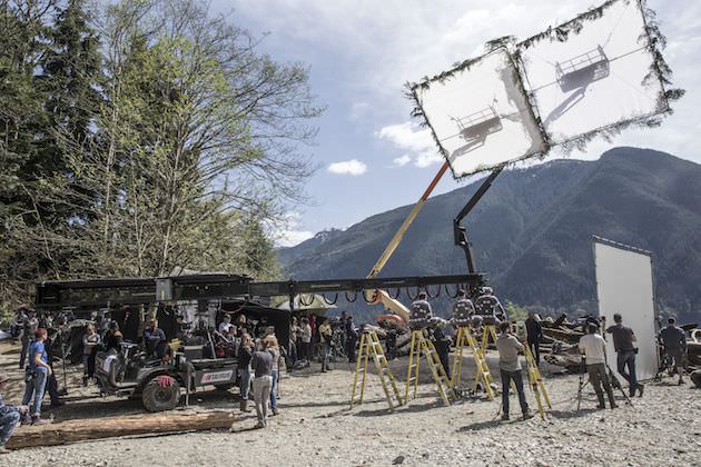 The film crew sets up their shot on the edge of the forest. Courtesy 20th Century Fox. 