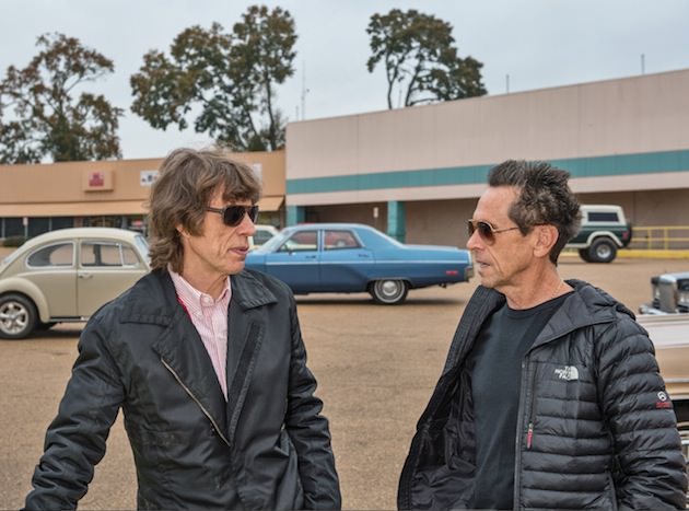 Producers MICK JAGGER and BRIAN GRAZER on the set