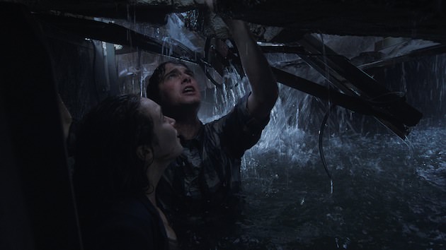 Kaitlyn (Alycia Debnam-Carey) and Donnie (Max Deacon) are in a real pit, with real water, on location in Michigan. Courtesy Warner Bros. Pictures.
