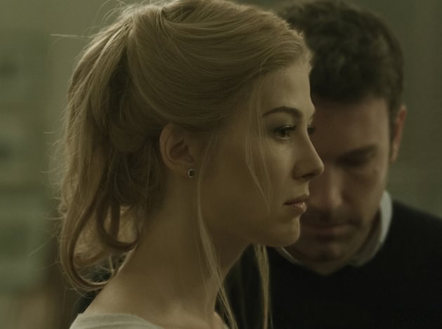 Rosamund Pike portrays Amy Dunne, whose mysterious disappearance turns her husband into a possible murder suspect.