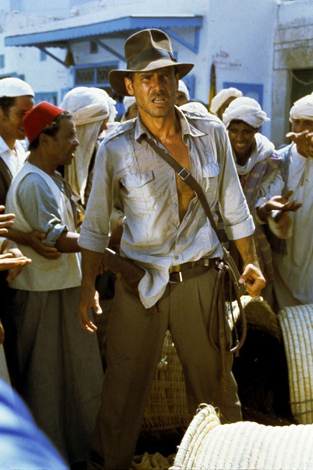 Indiana Jones (Harrison Ford) in Raiders of the Lost Ark, 1981. "Costume designer Deborah Nadoolman based the fedora on a model manufactured by Herbert Johnson on Savile Row, adjusting the crown and brim to flatter Ford's face." Courtesy 'Hollywood Costume' exhibit. 