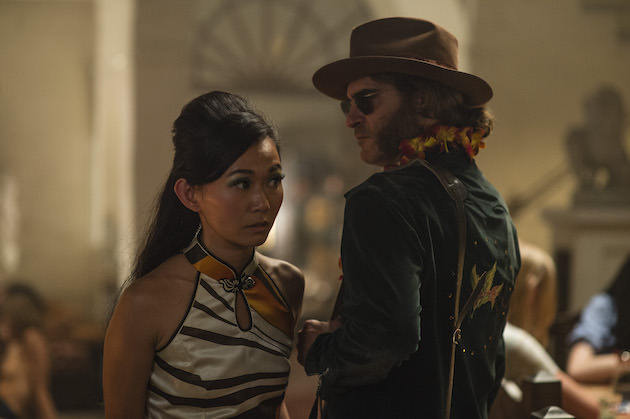 Jade (Hong Chau) and Doc during his investigation. Courtesy Warner Bros. Pictures. 