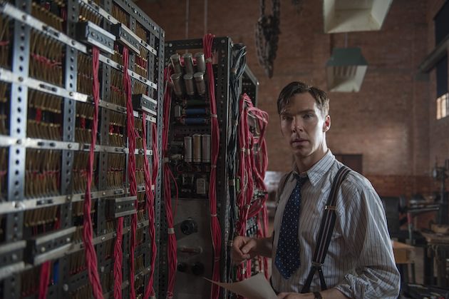 Alan Turing (Benedict Cumberbatch) stands in front of his codebreaking machine, 'Christopher,' which has a profusion of red wires for more than just practical reasons. Courtesy Weinstein Co. 