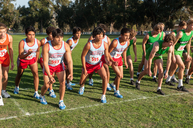 McFARLAND, USA..L to R: David Diaz (Rafael Martinez), Johnny Sameniego (Hector Duran), Thomas Valles (Carlos Pratts), Damacio Diaz (Michael Aguero), Jose Cardenas (Johnny Ortiz), Danny Diaz (Ramiro Rodriguez), and Victor Puentes (Sergio Avelar). Photo by Ron Phillips. Courtesy Walt Disney Studios 2015