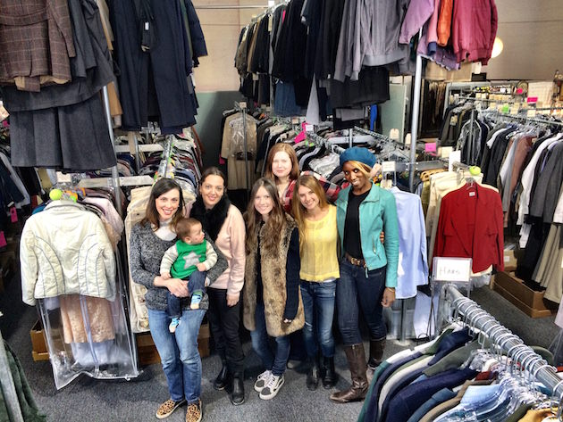 'The American's' costume department. (left to right) Katie Irish - Assistant Costume Designer (holding Desmond Chinn), Jenny Gering - Costume Designer, Bailey Gardner - PA, Sarah Moore - Tailor, Jenn O’Brien - Costume Coordinator, Liana John - PA