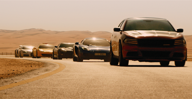 Among the fleet pictured are a black 2014 Dodge Viper for Letty (Rodriguez), Tej's yellow Ferrari, a blue McLaren P1 for Brian (Walker), and a white 2012 Bugatti Veryon for Roman (Gibson). Courtesy Universal Pictures. 