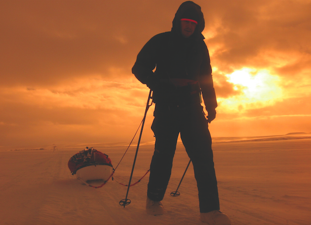 Karl dragging his sled across Alaska. Courtesy Karl Bushby