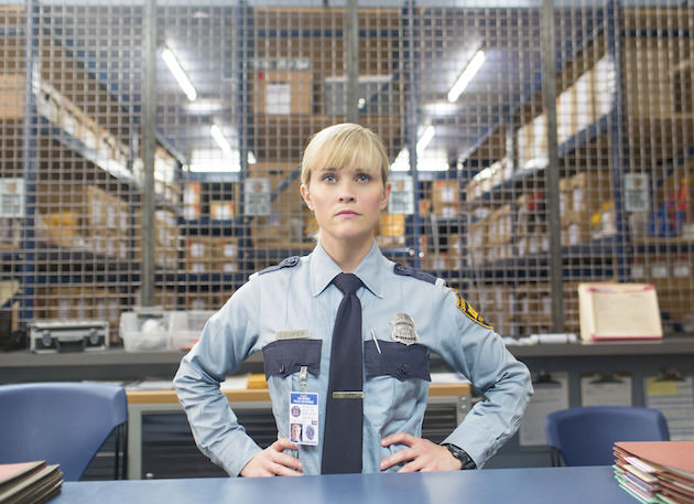 Reese Witherspoon as Cooper, a by the book cop who disdains girly dresses. Courtesy Warner Bros. Pictures. 