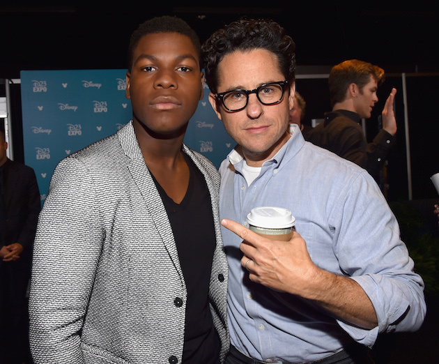 ANAHEIM, CA - AUGUST 15: Actor John Boyega (L) and director J.J. Abrams of STAR WARS: THE FORCE AWAKENS took part today in "Worlds, Galaxies, and Universes: Live Action at The Walt Disney Studios" presentation at Disney's D23 EXPO 2015 in Anaheim, Calif.  (Photo by Alberto E. Rodriguez/Getty Images for Disney) *** Local Caption *** John Boyega; J.J. Abrams