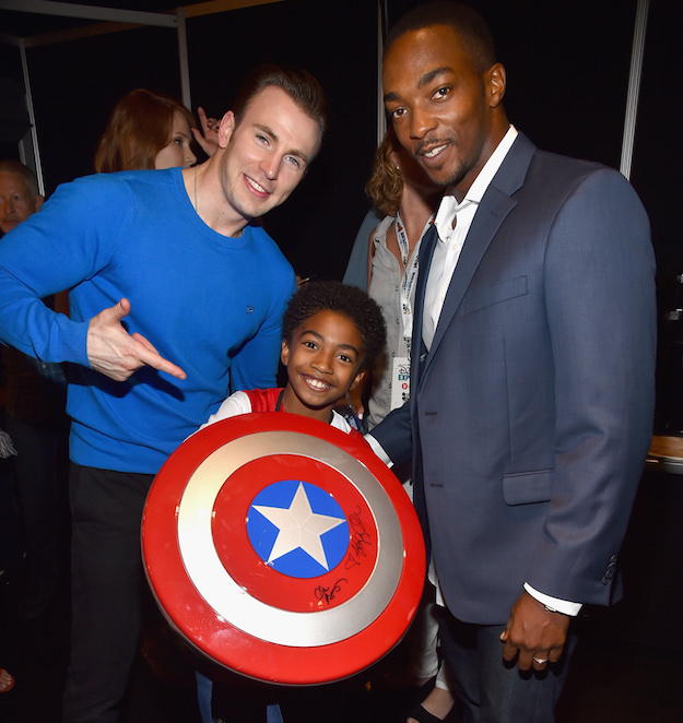 ANAHEIM, CA - AUGUST 15: (L-R) Actor Chris Evans of CAPTAIN AMERICA: CIVIL WAR, actor Miles Brown and actor Anthony Mackie of CAPTAIN AMERICA: CIVIL WAR took part today in "Worlds, Galaxies, and Universes: Live Action at The Walt Disney Studios" presentation at Disney's D23 EXPO 2015 in Anaheim, Calif.  (Photo by Alberto E. Rodriguez/Getty Images for Disney) 