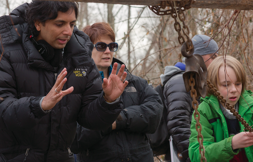 (L to R) Writer/Director/Producer M. NIGHT SHYAMALAN, cinematographer MARYSE ALBERTI and ED OXENBOULD as Tyler on the set of "The Visit". Photo by John Baer. Courtesy Universal Pictures.