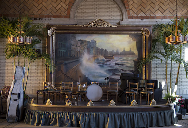 Custom built palm trees, a stage, a huge painting and more to evoke early 20th century Cuba. Courtesy HBO.