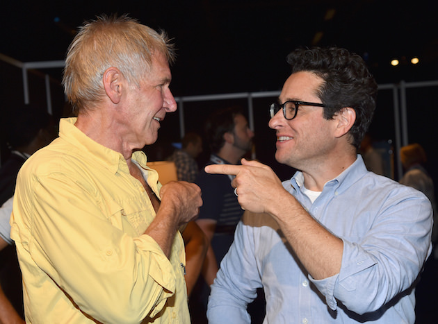 ANAHEIM, CA - AUGUST 15: Actor Harrison Ford (L) and director J.J. Abrams of STAR WARS: THE FORCE AWAKENS took part today in "Worlds, Galaxies, and Universes: Live Action at The Walt Disney Studios" presentation at Disney's D23 EXPO 2015 in Anaheim, Calif. (Photo by Alberto E. Rodriguez/Getty Images for Disney) *** Local Caption *** Harrison Ford; J.J. Abrams
