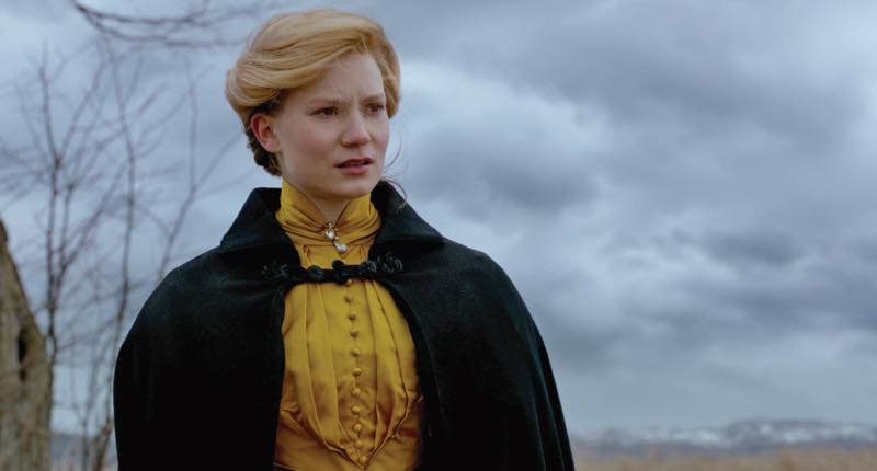 Mia Wasikowska as Edith Cushing in burnt orange. Courtesy Universal Pictures/Lionsgate. 