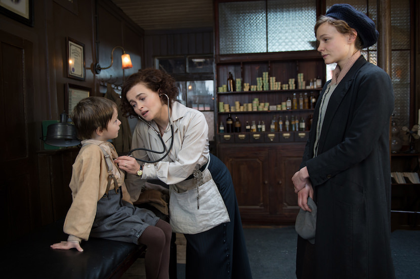 (L to R) Adam Michael Dodd as George Watts, Helene Bonham Carter as Edith Ellyn and Carey Mulligan as Maud Watts in director Sarah Gavron’s SUFFRAGETTE, a Focus Features release.   Credit : Steffan Hill / Focus Features