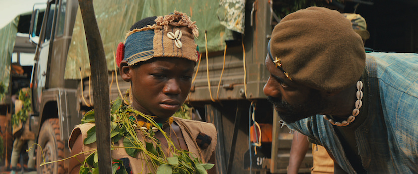 Idris Elba and Abraham Attah in the Netflix original film "Beasts of No Nation" Photo Courtesy Netflix