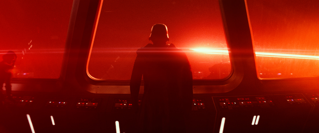 Kylo Ren contemplates finishing Darth Vader's work. Director J.J. Abrams is notorious for loving lens flare, which you get right here. Star Wars: The Force Awakens Ph: Film Frame © 2014 Lucasfilm Ltd. TM. All Right Reserved..