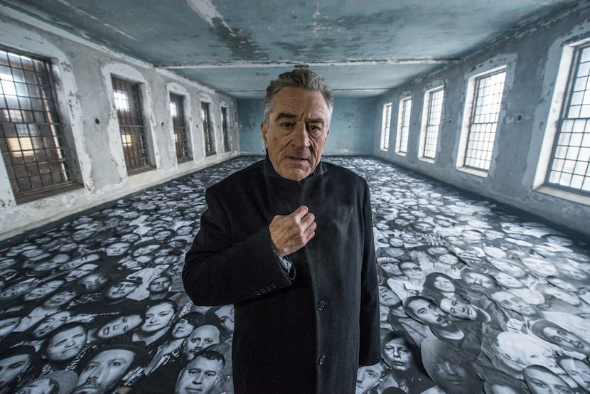 Ellis - Robert De Niro among thousands of portraits, on set.jpg