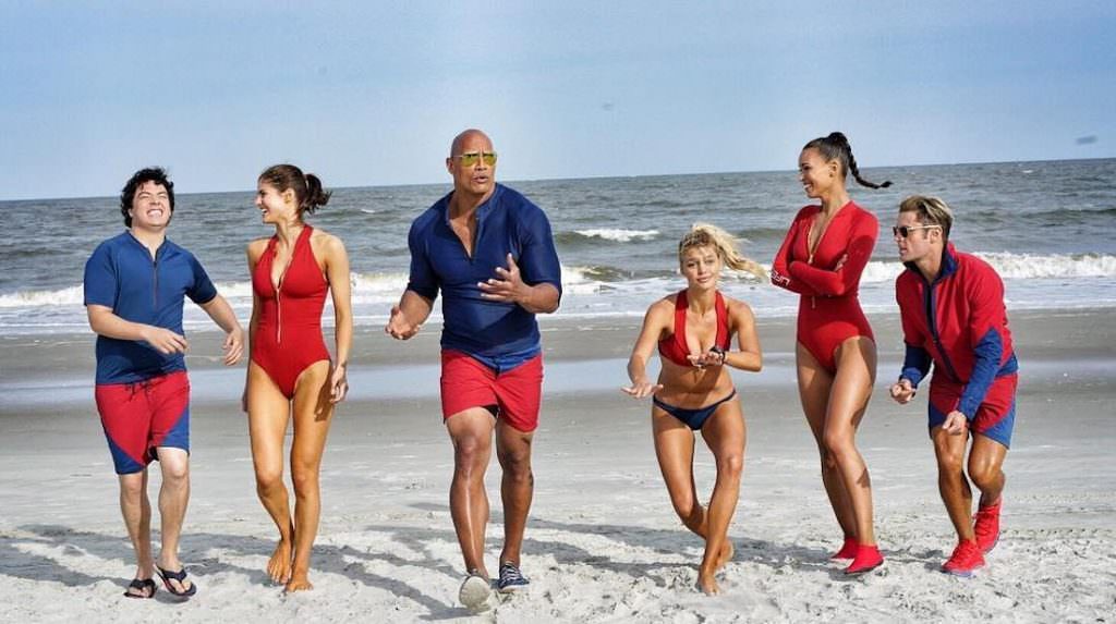 dwayne-johnson,-alexandra-daddario,-zac-efron,-ilfenesh-hadera,-jon-bass,-and-kelly-rohrbach-in-baywatch-(2017).jpg