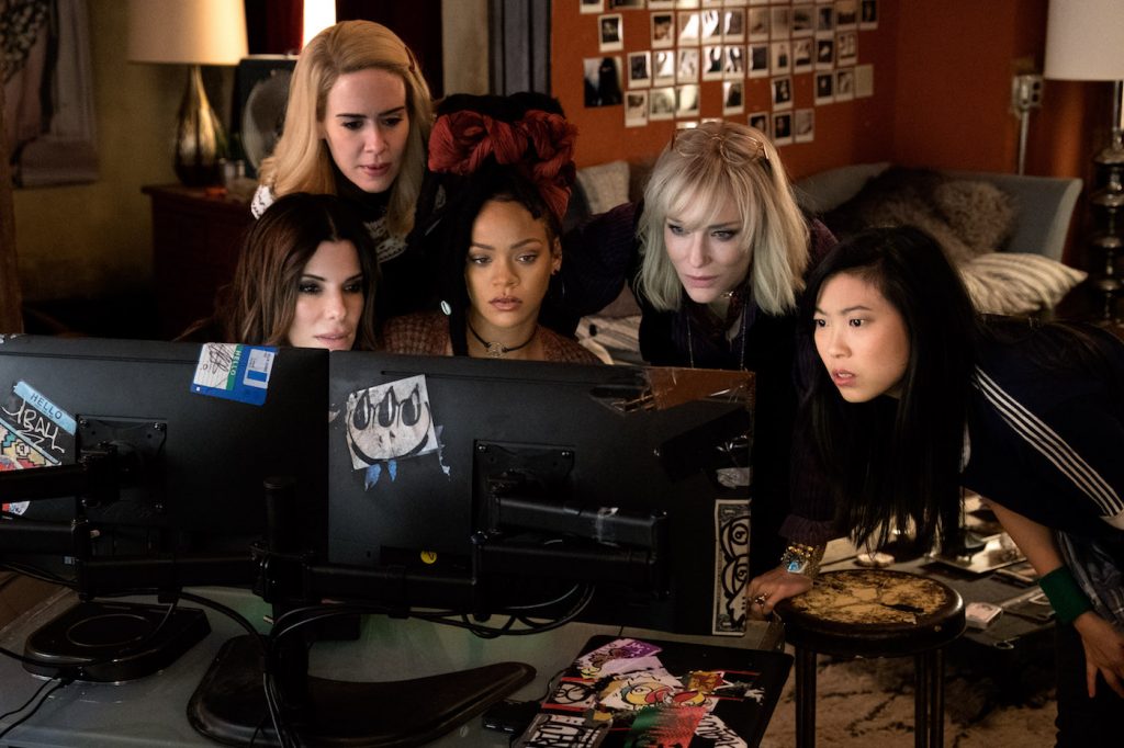 Caption: (L-R) SANDRA BULLOCK as Debbie Ocean, SARAH PAULSON as Tammy, RIHANNA as Nine Ball, CATE BLANCHETT as Lou and AWKWAFINA as Constance in Warner Bros. Pictures' and Village Roadshow Pictures' "OCEANS 8," a Warner Bros. Pictures release. Photo Credit: Barry Wetcher