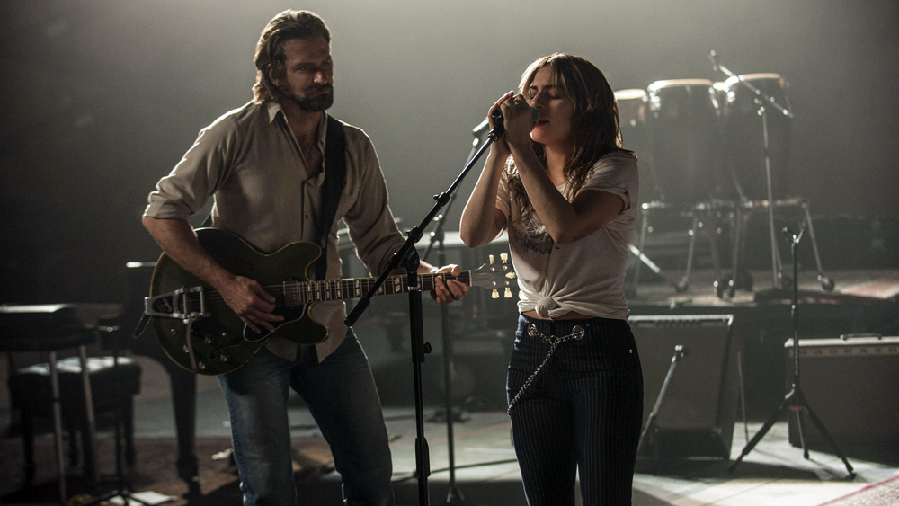 (L-R) BRADLEY COOPER as Jackson Maine and LADY GAGA as Ally in the drama "A STAR IS BORN,” from Warner Bros. Pictures, in association with Live Nation Productions and Metro-Goldwyn-Mayer Pictures, a Warner Bros. Pictures release. Photo Credit: Neal Preston