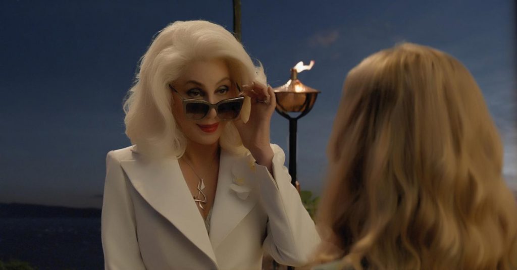 Ruby (CHER) surprises granddaughter Sophie (AMANDA SEYFRIED) in "Mamma Mia! Here We Go Again." Photo Credit: Universal Pictures