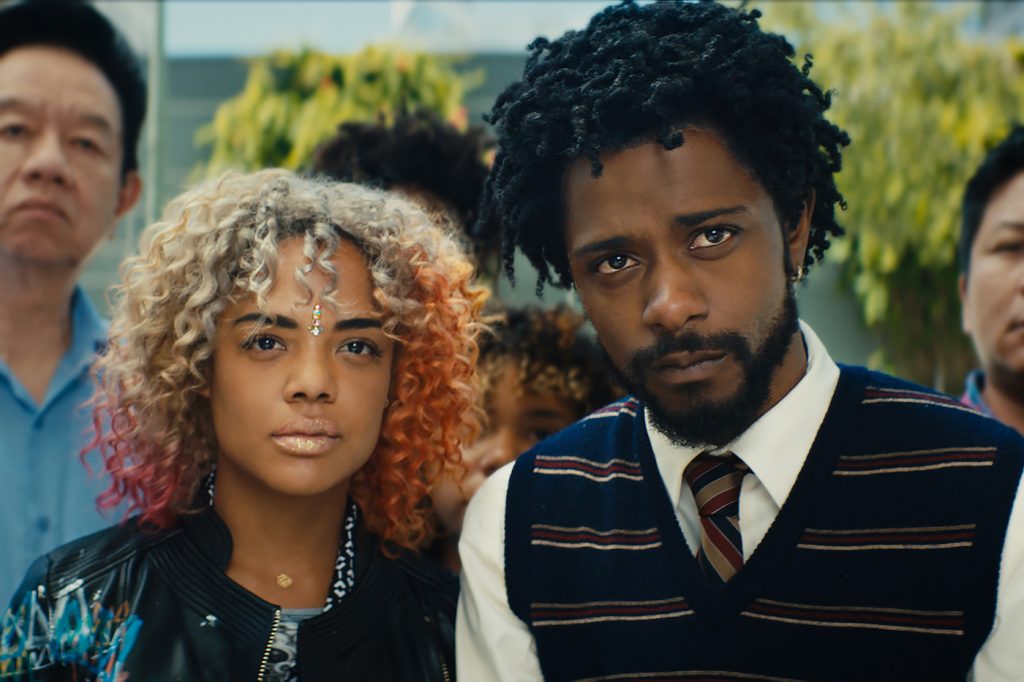 (l to r.) Tessa Thompson as Detroit and Lakeith Stanfield as Cassius Green star in director Boots Riley's SORRY TO BOTHER YOU, an Annapurna Pictures release. Photo Credit: Annapurna Pictures