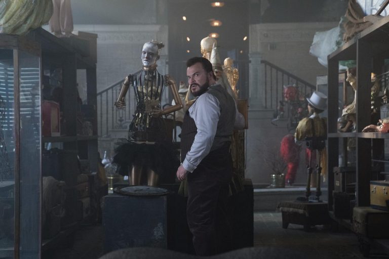Uncle Jonathan (Jack Black) with a collection of objects that aren’t quite what they seem in "The House With A Clock in Its Walls," the spine-tingling, magical adventure of a boy who goes to live with his eccentric uncle in a creaky old house with a mysterious tick-tocking heart. Based on the first volume in the beloved children's series of books, the film is directed by master frightener Eli Roth. Photo Credit: Quantrell Colbert/Universal Pictures and Amblin Entertainment