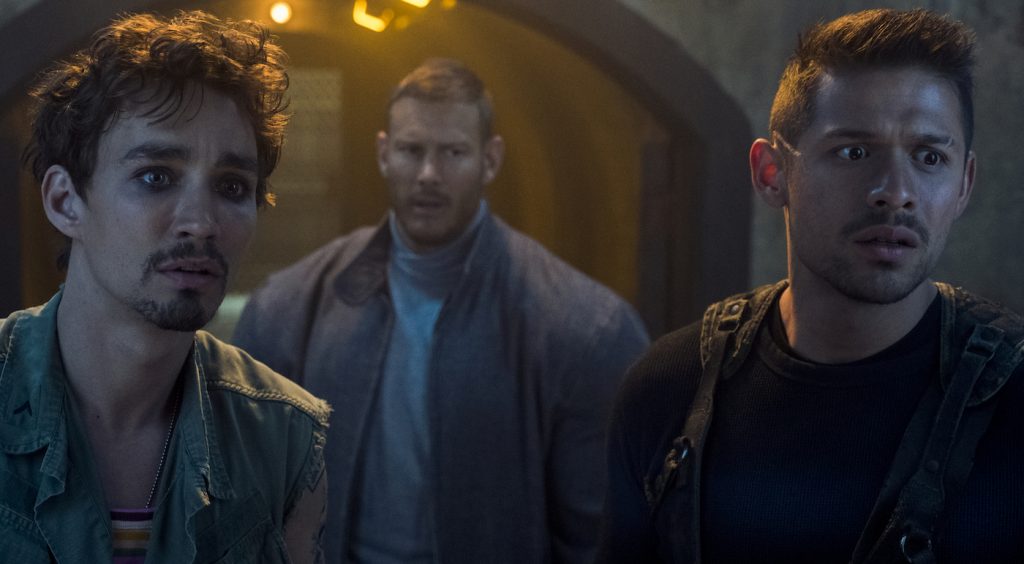 L-r: Robert Sheehan, Tom Hopper and David Castañeda in THE UMBRELLA ACADEMY. Courtesy Neflix.