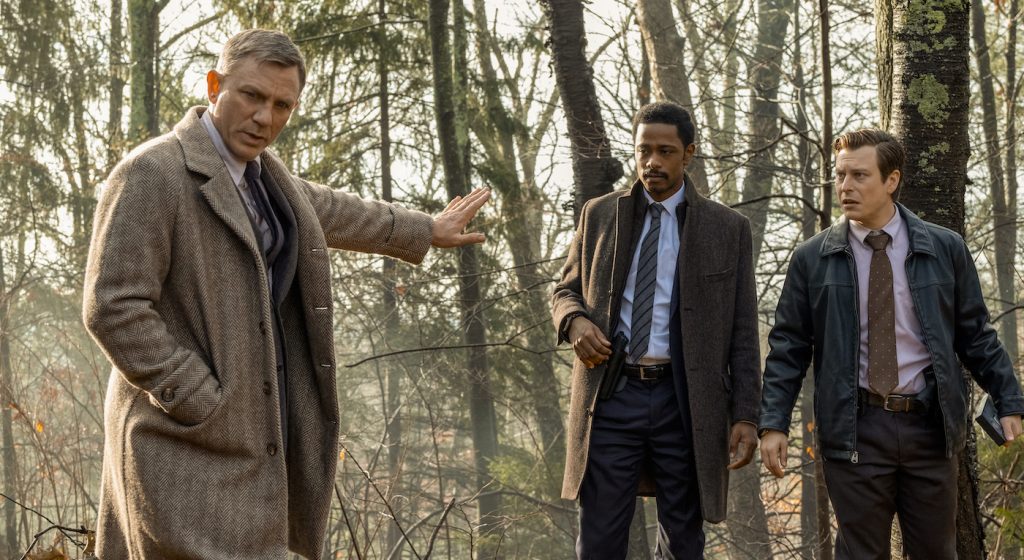 Benoit Blanc (Daniel Craig), Lt. Elliot (Lakeith Stanfield), Trooper Wagner (Noah Segan) in 'Knives Out.' Photo credit: Claire Folger/Lionsgate