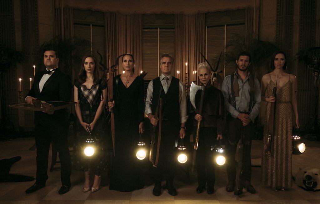 (L to R) Kristian Bruun, Melanie Scrofano, Andie MacDowell, Henry Czerny, Nicky Guadagni, Adam Brody, and Elyse Levesque in the film READY OR NOT. Photo by Eric Zachanowich. © 2019 Twentieth Century Fox Film Corporation All Rights Reserved