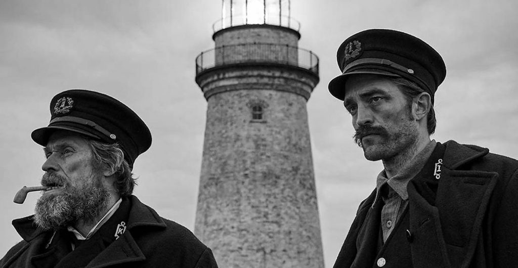 L-r: Willem Dafoe and Robert Pattinson in 'The Lighthouse.' Courtesy A24.