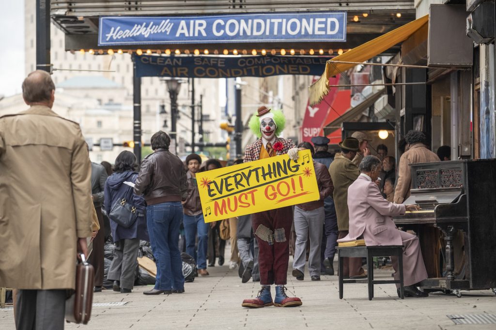 Caption: JOAQUIN PHOENIX as Arthur Fleck in Warner Bros. Pictures, Village Roadshow Pictures and BRON Creative’s “JOKER,” a Warner Bros. Pictures release. Photo Credit: Niko Tavernise