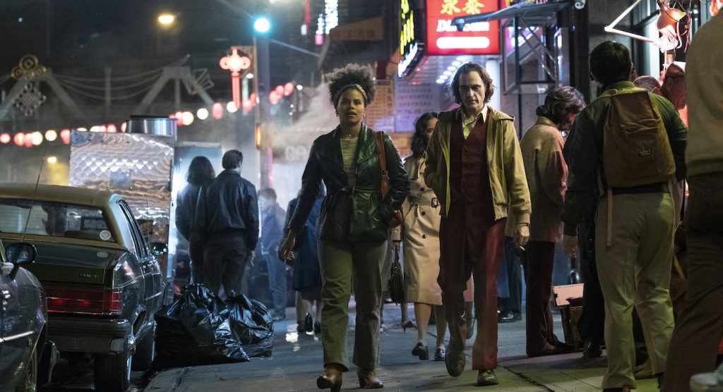 Caption: (L-r) ZAZIE BEETZ as Sophie Dumond and JOAQUIN PHOENIX as Arthur Fleck in Warner Bros. Pictures, Village Roadshow Pictures and BRON Creative’s “JOKER,” a Warner Bros. Pictures release.