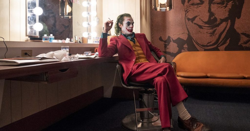 Caption: JOAQUIN PHOENIX as Arthur Fleck in Warner Bros. Pictures, Village Roadshow Pictures and BRON Creative’s “JOKER,” a Warner Bros. Pictures release. Photo Credit: Niko Tavernise