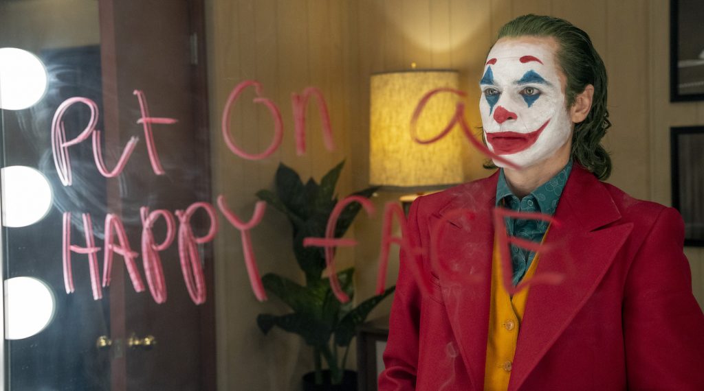 Caption: JOAQUIN PHOENIX as Arthur Fleck in Warner Bros. Pictures, Village Roadshow Pictures and BRON Creative’s “JOKER,” a Warner Bros. Pictures release. Photo Credit: Niko Tavernise