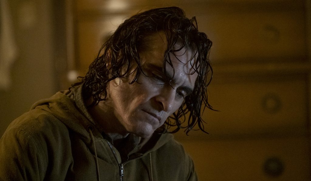 Caption: JOAQUIN PHOENIX as Arthur Fleck in Warner Bros. Pictures, Village Roadshow Pictures and BRON Creative’s “JOKER,” a Warner Bros. Pictures release. Photo Credit: Niko Tavernise