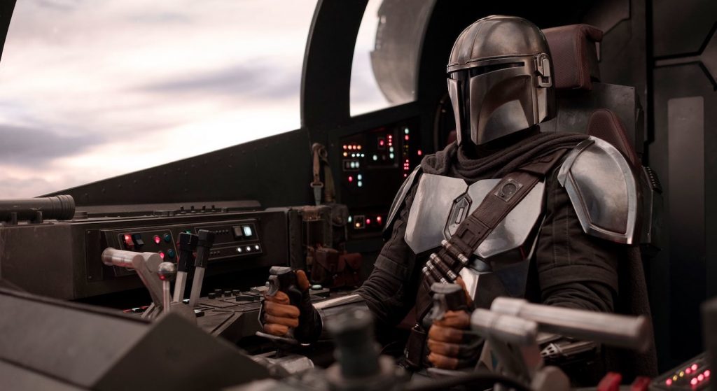 The Mandalorian (Pedro Pascal) in his ship the Falcon Crest. Courtesy Walt Disney Studios