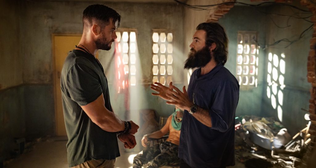 L-r: Chris Hemsworth and Sam Hargarve on the set of 'Extraction.' Courtesy Jasin Boland/Netflix.