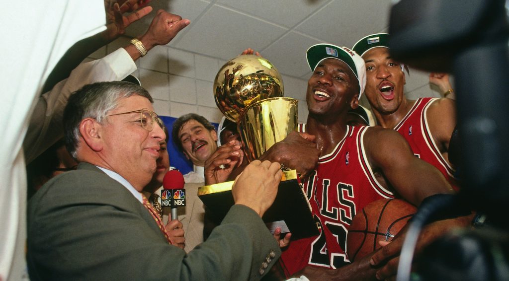 PHOENIX - JUNE 20: NBA Commissioner David Stern presents Michael Jordan and the Chicago Bulls the championship trophy after the Bulls defeated the Phoenix Suns in Game Six of the 1993 NBA Finals on June 20, 1993 at America West Arena in Phoenix, Arizona. (Photo by Andrew D. Bernstein/NBAE via Getty Images)