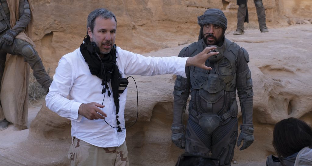 Caption: (L-r) Director DENIS VILLENEUVE and JAVIER BARDEM on the set of Warner Bros. Pictures and Legendary Pictures’ action adventure “DUNE,” a Warner Bros. Pictures release. Photo Credit: Chiabella James