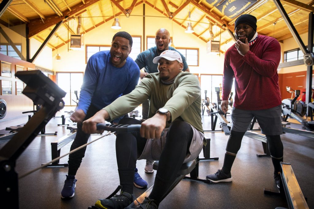 Malcolm Hawkins and the team working out. ©2019 Richard Schultz. Courtesy 50 Eggs Films