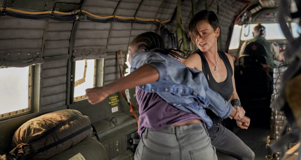 THE OLD GUARD (2020) L-R: Kiki Layne ("Nile"), Charlize Theron ("Andy") Photo Credit: AIMEE SPINKS/NETFLIX ©2020