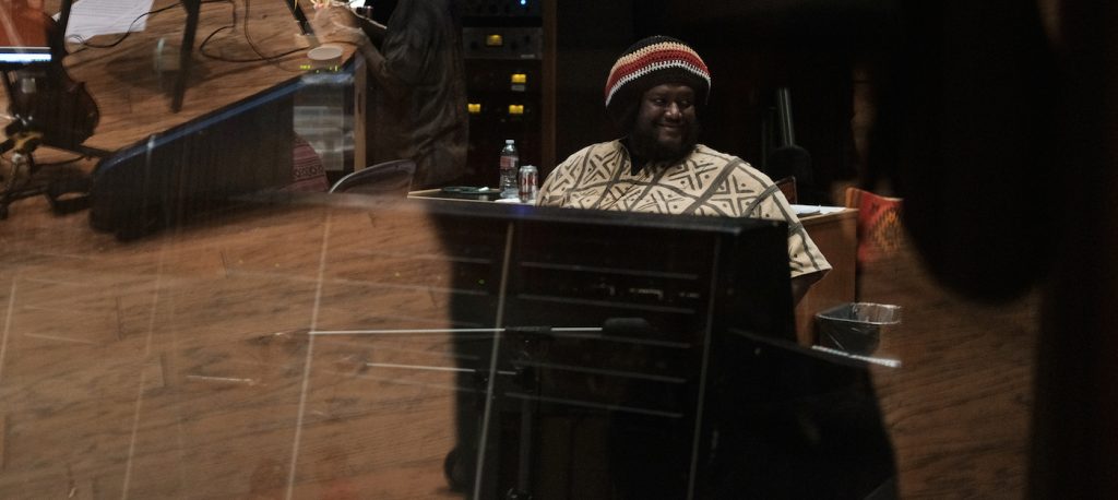 Kamasi Washington composing 'Becoming.' Courtesy Netflix.