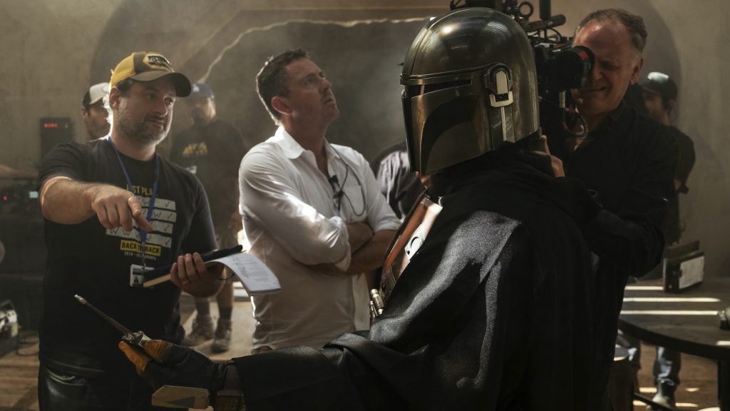 Dave Filoni, Greig Frazer and Baz Idoine on the set of THE MANDALORIAN, eclusively on Disney+