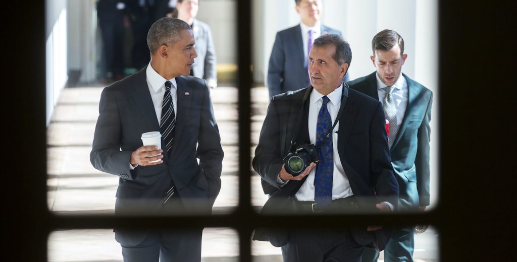 President Barack Obama walks along the West Colonnade of the White House with Chief White House Photographer Pete Souza  Feb. 18, 2016. (Official White House Photo by Lawrence Jackson)